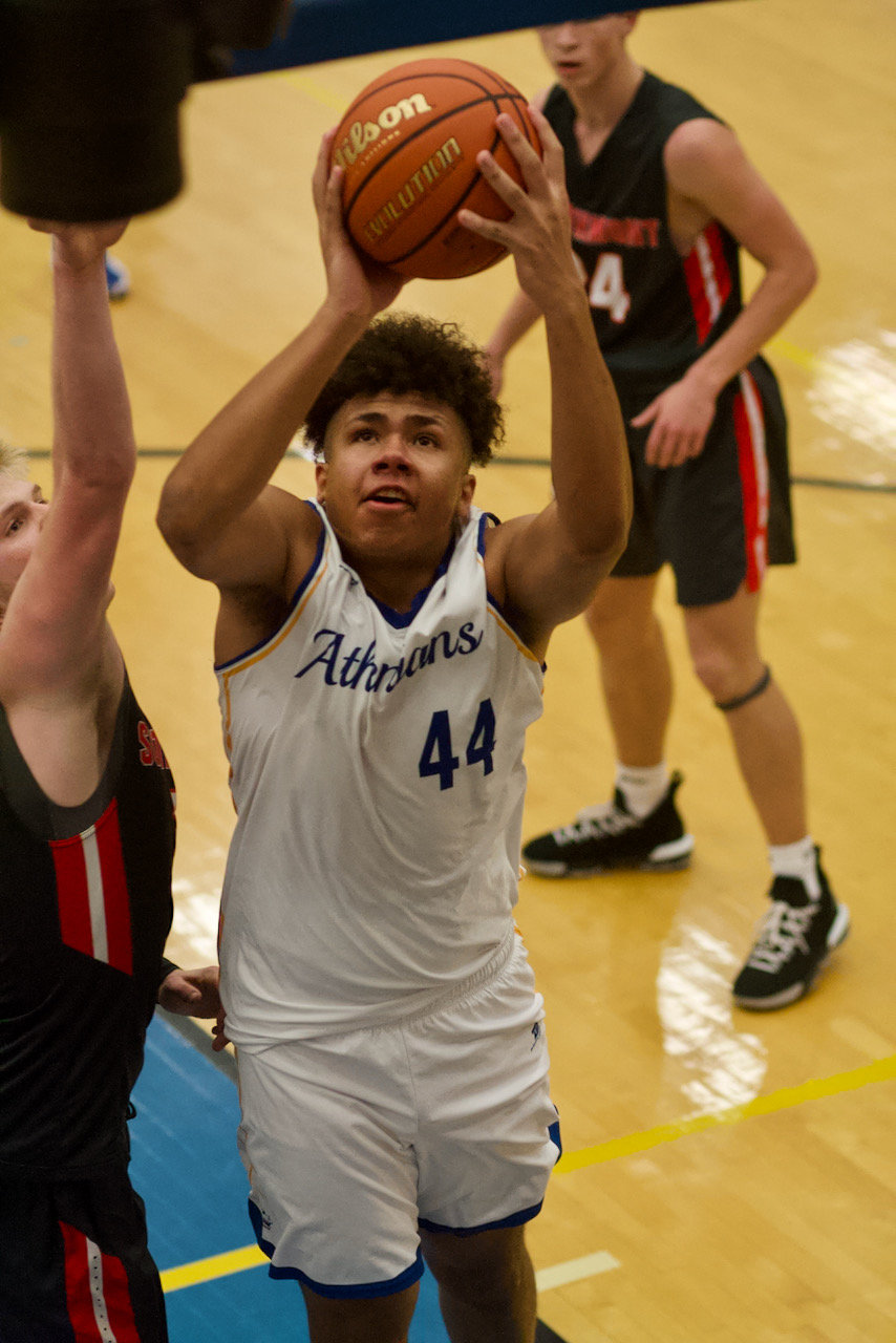 Mekhi Wallace scored eight points and played great interior defense for the Athenians in their Sugar Creek Classic Championship win.